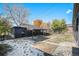 Landscaped backyard with patio, providing ample outdoor space at 862 Pontiac St, Denver, CO 80220