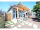 Charming backyard studio with a modern pergola and ample natural light at 3735 Inca St, Denver, CO 80211