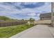 Backyard with patio and play structure at 4433 N Picadilly Ct, Aurora, CO 80019