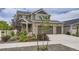 Charming two-story home with a three car garage and well-maintained landscaping at 4433 N Picadilly Ct, Aurora, CO 80019