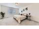 Serene main bedroom featuring neutral tones, ample natural light, and tasteful decor, creating a relaxing retreat at 4433 N Picadilly Ct, Aurora, CO 80019