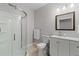Bathroom with shower, toilet, sink, and light wood-style flooring at 3344 Evening Pl, Castle Rock, CO 80109