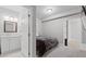 Bright bedroom includes a connected bathroom and walk-in closet at 3344 Evening Pl, Castle Rock, CO 80109