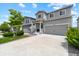 Charming two-story home with a two-car garage and manicured landscaping at 3344 Evening Pl, Castle Rock, CO 80109