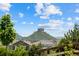 Breathtaking view of a picturesque mountain, enhancing the property's appeal with its natural beauty and serene surroundings at 3344 Evening Pl, Castle Rock, CO 80109