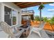 Inviting outdoor patio area with comfortable seating and a cozy ambiance, perfect for relaxing or entertaining guests at 3344 Evening Pl, Castle Rock, CO 80109