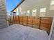 Private backyard with wooden fence and patio at 4723 Joplin St, Denver, CO 80239
