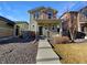 Two-story house with front porch and landscaping at 4723 Joplin St, Denver, CO 80239