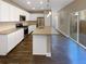 Modern kitchen with white cabinets and granite countertops at 4723 Joplin St, Denver, CO 80239