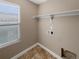 Laundry room with shelving and window at 4723 Joplin St, Denver, CO 80239