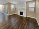 Living room with fireplace and hardwood floors at 4723 Joplin St, Denver, CO 80239