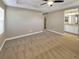 Main bedroom with carpet flooring and access to bathroom at 4723 Joplin St, Denver, CO 80239