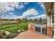 Outdoor grill area with stone counter, stainless steel grill, and stunning backyard views at 8392 Niwot Meadow Farm Rd, Niwot, CO 80503