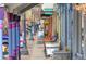 Charming town storefronts with unique awnings, colorful pillars, and antique shops at 8392 Niwot Meadow Farm Rd, Niwot, CO 80503