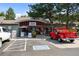 Exterior view of quaint local market with red vintage Chevrolet truck parked out front at 8392 Niwot Meadow Farm Rd, Niwot, CO 80503