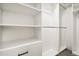 Spacious walk-in closet with ample shelving and rod space for organized storage at 7320 W 21St Ave, Lakewood, CO 80214