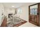 Formal dining room with a fireplace, room for six, and wood trim at 1740 S Estes St, Lakewood, CO 80232
