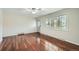 Inviting living room features gleaming hardwood floors and lots of natural light at 1740 S Estes St, Lakewood, CO 80232