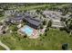 Stunning aerial view of the community clubhouse, pool, and well-maintained grounds at 7852 S Addison Way, Aurora, CO 80016