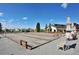 Well-maintained bocce ball court with comfortable seating, perfect for outdoor recreation at 7852 S Addison Way, Aurora, CO 80016