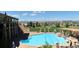 Relaxing community pool area with lap lanes, comfortable seating, and scenic views at 7852 S Addison Way, Aurora, CO 80016
