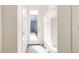 Hallway and mud room area featuring a door to the outside and convenient storage cubbies at 2321 S Acoma St, Denver, CO 80223