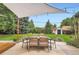 This backyard is perfect for entertaining with its ample seating area and lush green space at 7491 W 45Th Ave, Wheat Ridge, CO 80033