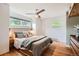 Bright bedroom with hardwood floors, natural light, and a neutral color palette at 7491 W 45Th Ave, Wheat Ridge, CO 80033