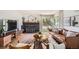 Bright living room with a fireplace, hardwood floors, and stylish decor at 7491 W 45Th Ave, Wheat Ridge, CO 80033