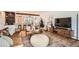 Spacious living room with modern furniture, hardwood floors, and plenty of natural light at 7491 W 45Th Ave, Wheat Ridge, CO 80033