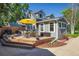 Backyard view of home with a deck perfect for dining and entertaining on a sunny day at 3943 Newton St, Denver, CO 80211
