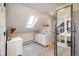 Bedroom view through glass paneled doors, with ample light and storage at 3943 Newton St, Denver, CO 80211