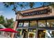 Charming brick coffee shop with large windows, street view at 3943 Newton St, Denver, CO 80211
