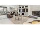 Bright living room featuring built-in storage and cozy fireplace at 325 Clayton St, Denver, CO 80206