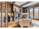 Cozy office space with custom wood finishes, fireplace, and an adjacent balcony at 325 Clayton St, Denver, CO 80206