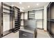 Large walk-in closet with custom shelving and ample storage space at 325 Clayton St, Denver, CO 80206