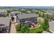 Spacious backyard patio, red umbrella, and ample seating, perfect for outdoor entertaining at 3891 W 149Th Ave, Broomfield, CO 80023
