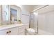 Bright and clean bathroom with a glass-enclosed shower, fresh vanity and modern sink, and ample lighting at 3891 W 149Th Ave, Broomfield, CO 80023