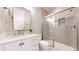 Bright bathroom featuring a modern vanity, stylish tile work in shower, and a glass shower enclosure at 3891 W 149Th Ave, Broomfield, CO 80023