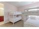 Charming pink bedroom featuring white bunk beds with heart patterned bedding and carpeted floors at 3891 W 149Th Ave, Broomfield, CO 80023