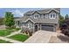 Beautiful two-story home with stone accents, manicured lawn and attached two car garage at 3891 W 149Th Ave, Broomfield, CO 80023