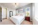 Serene main bedroom featuring a comfortable bed, neutral colors, and natural light at 3891 W 149Th Ave, Broomfield, CO 80023