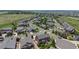 Aerial view of a suburban neighborhood featuring well-maintained homes and tree-lined streets at 3891 W 149Th Ave, Broomfield, CO 80023
