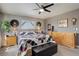 Inviting bedroom with neutral color scheme, ceiling fan and great lighting at 13695 W 67Th Cir, Arvada, CO 80004