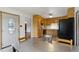 Eat-in kitchen with ample storage cabinets and modern appliances; eat-in table at 2410 S Lima St, Aurora, CO 80014