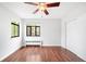 Cozy bedroom with hardwood floors, ceiling fan, and ample natural light at 636 N Washington St # 301, Denver, CO 80203