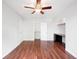 Spacious bedroom boasts hardwood floors, ceiling fan, and closet with a built-in desk at 636 N Washington St # 301, Denver, CO 80203