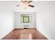 Bedroom with hardwood floors, window, and natural light at 636 N Washington St # 301, Denver, CO 80203