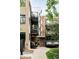 Close-up of apartment entrance with brick facade, wrought-iron balconies, and secure mailboxes at 636 N Washington St # 301, Denver, CO 80203