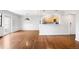Living area with hardwood floors, stainless steel appliances, and plenty of light at 636 N Washington St # 301, Denver, CO 80203